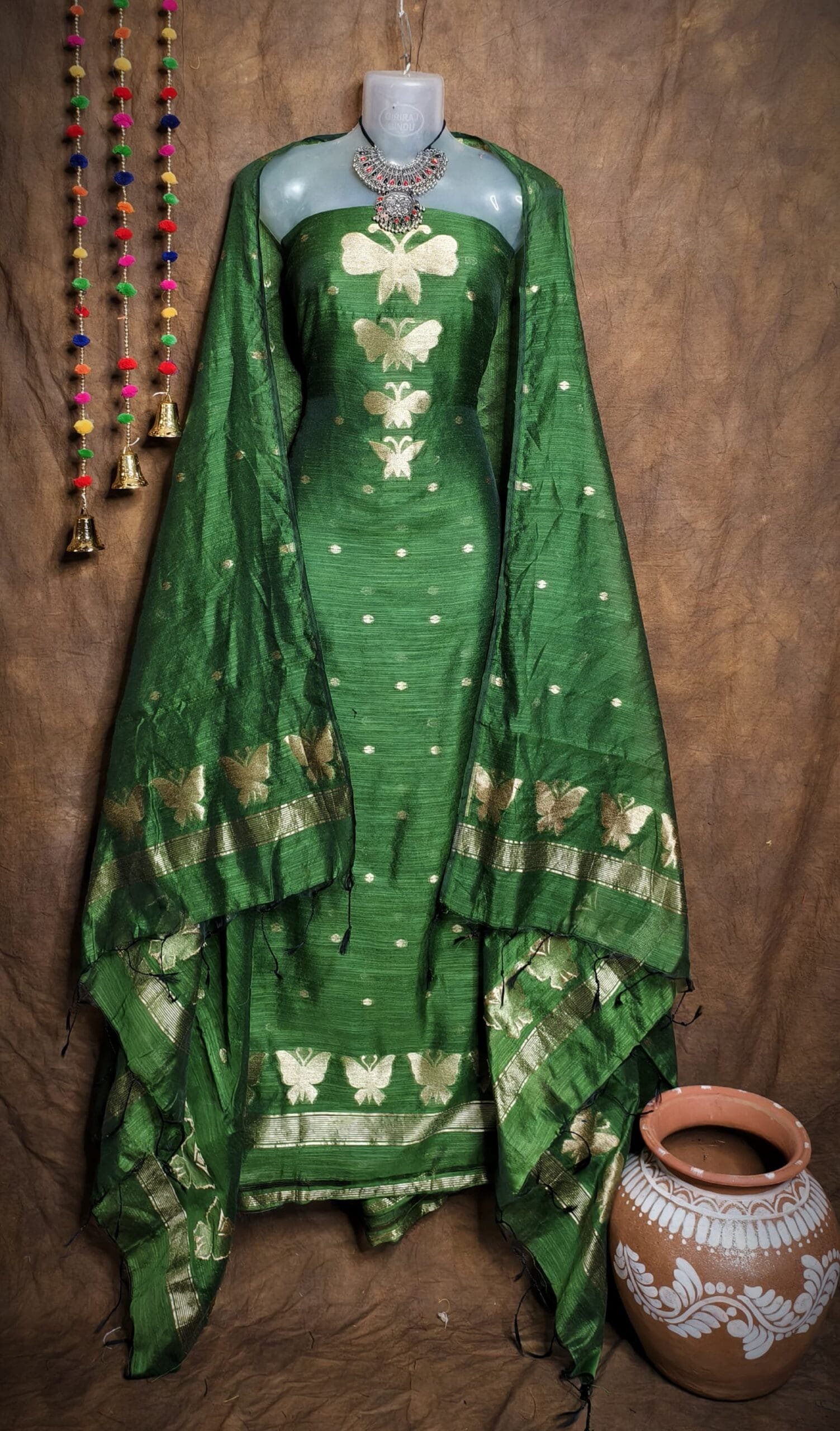 Butterfly-Gold Dark Green Unstitched 2 Piece Jamdani Suit Set 1 New Butterfly Dark Green Muga Cotton Unstitched Jamdani Suit Set
