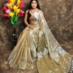 Exclusive Dual Tone Plain Tissue Sari With Chumki Work