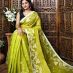 Exclusive Dual Tone Shiuli Tissue Sari With Blouse Piece